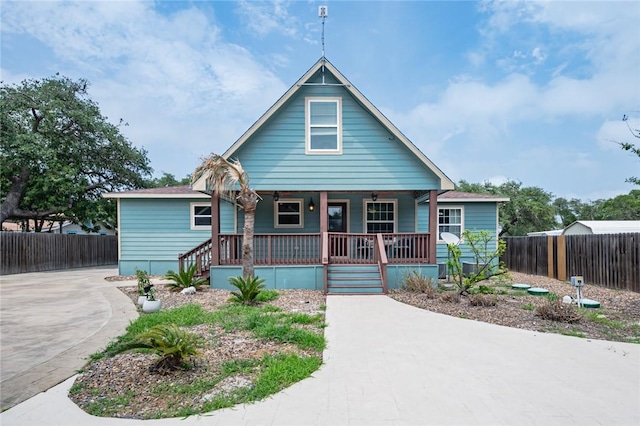123 Bishop Rd, Rockport, TX 78382 - bungalow-style house with a porch and stairway