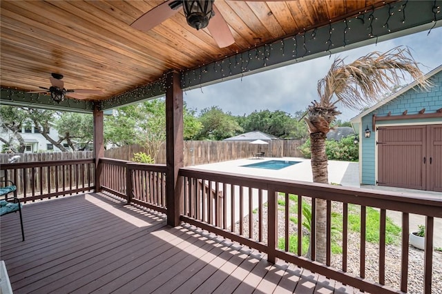 123 Bishop Rd, Rockport, TX 78382 - wooden deck with a ceiling fan and a fenced backyard