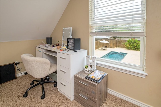 123 Bishop Rd, Rockport, TX 78382 - office area featuring carpet, vaulted ceiling, and baseboards