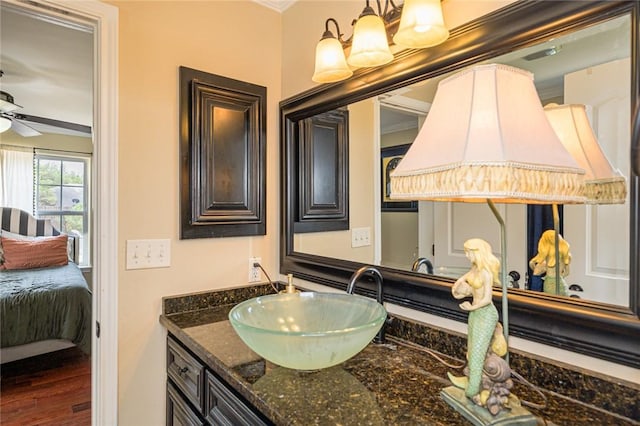 123 Bishop Rd, Rockport, TX 78382 - ensuite bathroom featuring vanity, a ceiling fan, and crown molding