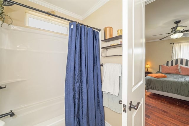 123 Bishop Rd, Rockport, TX 78382 - bathroom featuring ornamental molding, shower / bath combo with shower curtain, connected bathroom, wood finished floors, and a ceiling fan