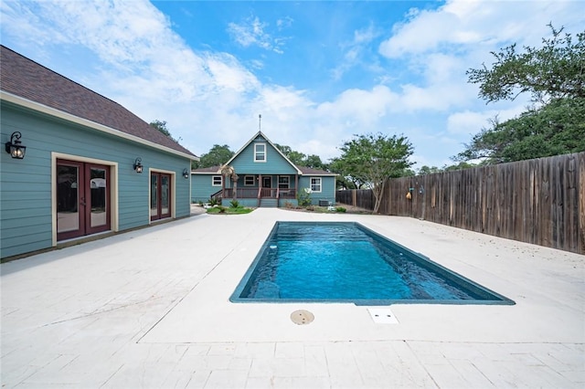 123 Bishop Rd, Rockport, TX 78382 - view of swimming pool featuring a patio and french doors