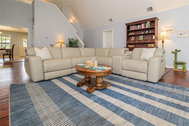 123 Bishop Rd, Rockport, TX 78382 - living area featuring hardwood / wood-style flooring, vaulted ceiling, and baseboards