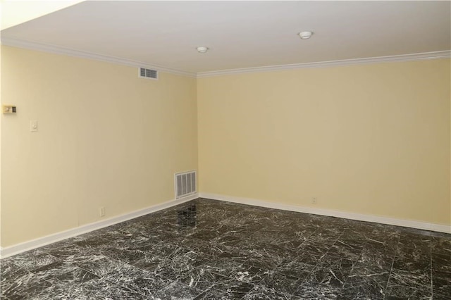 empty room featuring ornamental molding