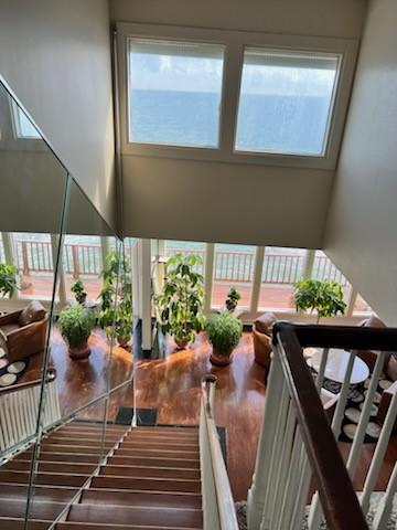 4454 Ocean Dr Unit 4, Corpus Christi, TX 78412 - stairway with a high ceiling