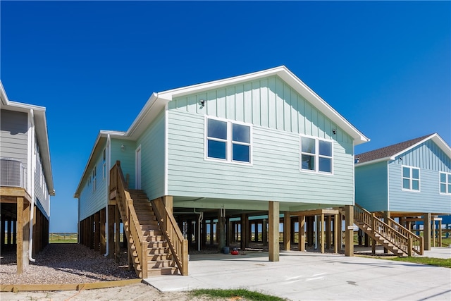 rear view of house with a carport