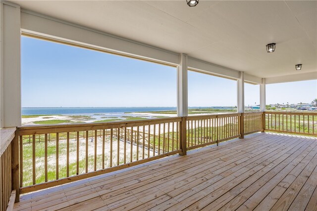 deck featuring a water view