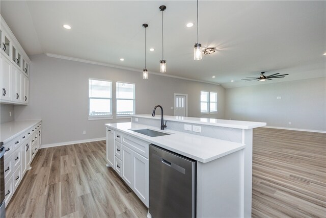 kitchen featuring white cabinetry, sink, a center island with sink, stainless steel dishwasher, and light hardwood / wood-style flooring