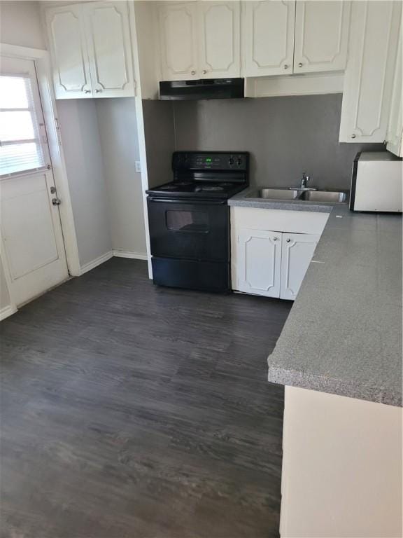 kitchen featuring white cabinets, dark hardwood / wood-style floors, black electric range, and sink