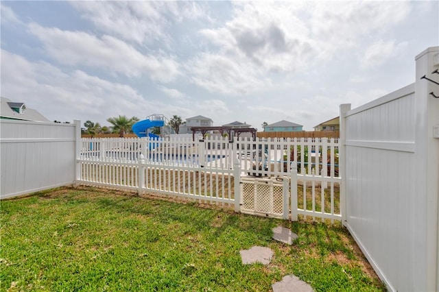 view of yard featuring fence