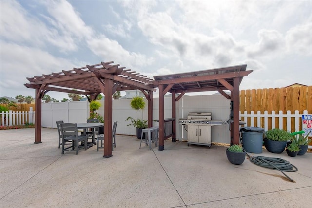 view of patio / terrace with a fenced backyard, a grill, a pergola, and outdoor dining space