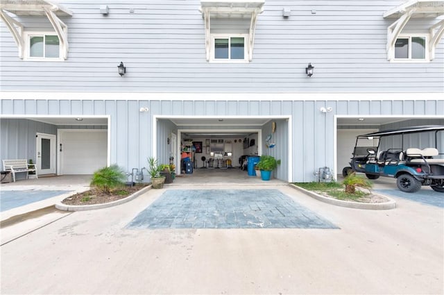 garage featuring decorative driveway