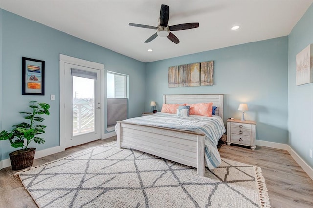 bedroom featuring baseboards, ceiling fan, wood finished floors, access to exterior, and recessed lighting