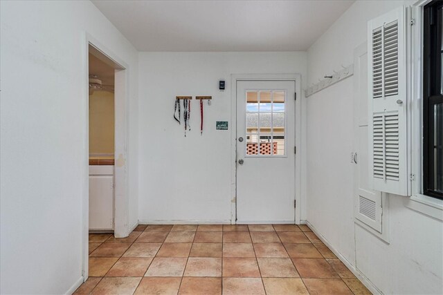 interior space with light tile patterned floors