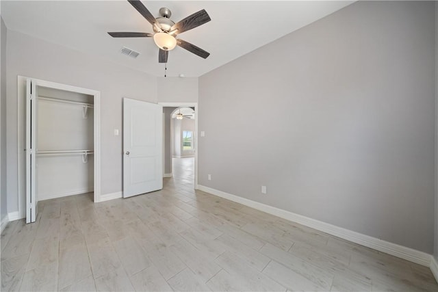 1706 Kentucky Derby Dr, Corpus Christi, TX 78417 - unfurnished bedroom featuring a closet, light wood finished floors, baseboards, visible vents, and ceiling fan
