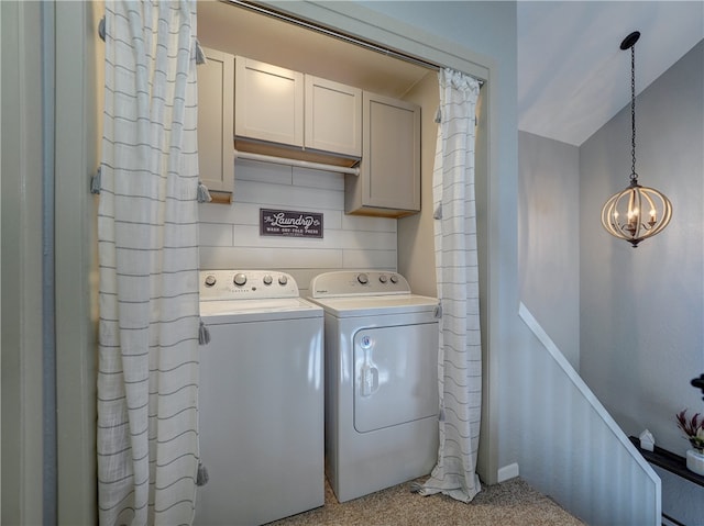 laundry room featuring cabinet space and washer and dryer