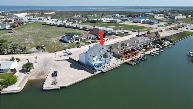 bird's eye view featuring a residential view and a water view