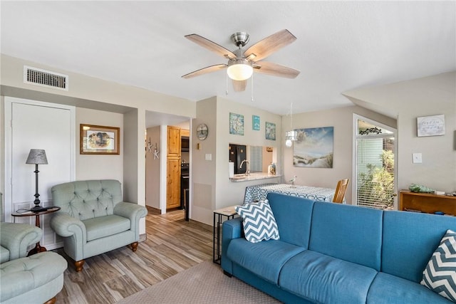 14300 Aloha St N Unit 139, Corpus Christi, TX 78418 - living room featuring wood finished floors and ceiling fan