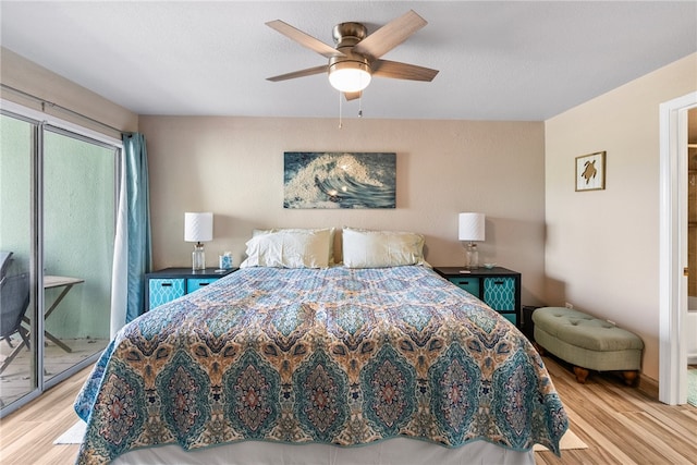 bedroom featuring light wood-type flooring, ceiling fan, and access to exterior