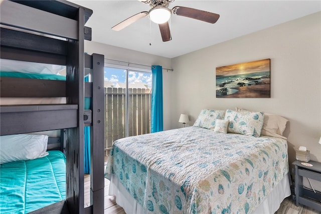 bedroom with ceiling fan, light hardwood / wood-style flooring, and access to outside