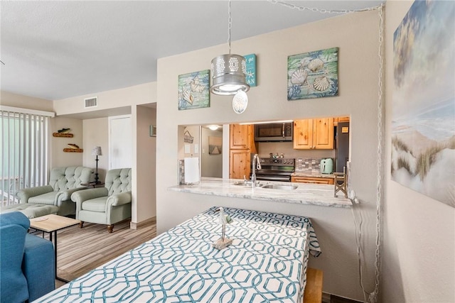 14300 Aloha St N Unit 139, Corpus Christi, TX 78418 - dining room featuring wood finished floors