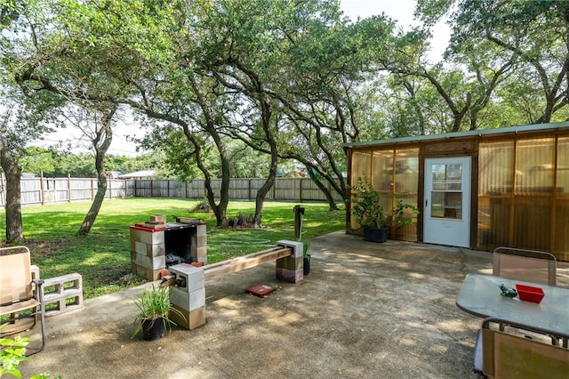 507 S Terry St, Rockport, TX 78382 - fenced backyard with a patio area