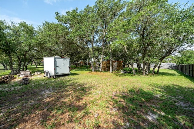 507 S Terry St, Rockport, TX 78382 - view of yard featuring a storage unit