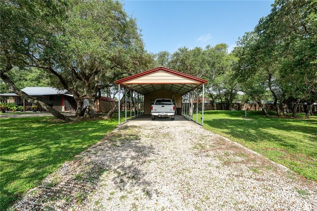 507 S Terry St, Rockport, TX 78382 - view of vehicle parking with gravel driveway and a carport