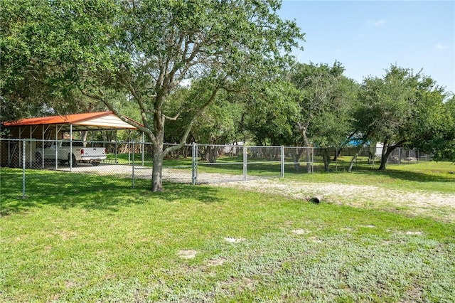 507 S Terry St, Rockport, TX 78382 - view of yard with a carport and driveway