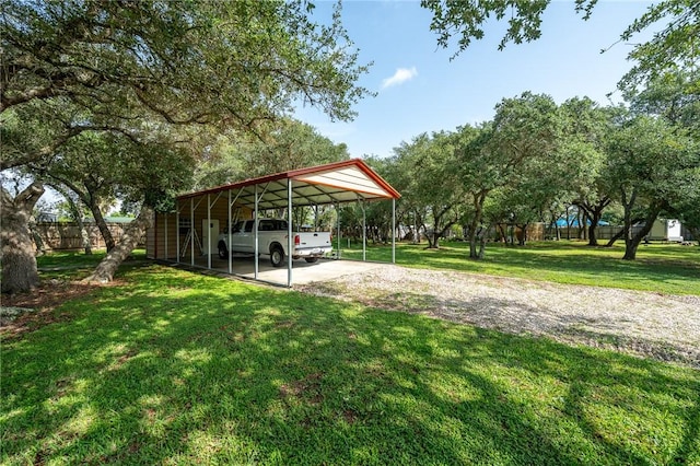 507 S Terry St, Rockport, TX 78382 - view of yard featuring gravel driveway and a carport