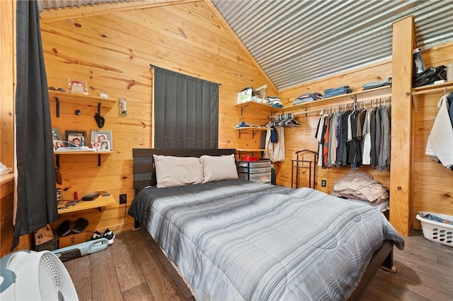 507 S Terry St, Rockport, TX 78382 - bedroom featuring vaulted ceiling, wood walls, wood finished floors, a closet, and wood ceiling