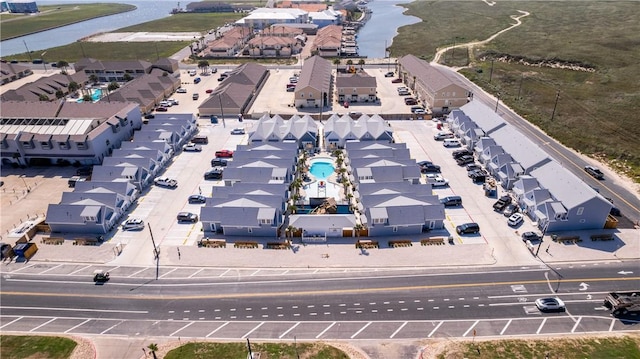 drone / aerial view with a water view