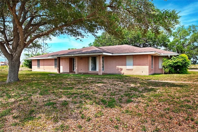 3701 Ih 69 Access Hwy, Corpus Christi, TX 78410 - view of front facade with a front lawn and brick siding