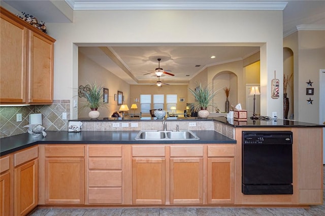 kitchen featuring a sink, a ceiling fan, black dishwasher, backsplash, and dark countertops