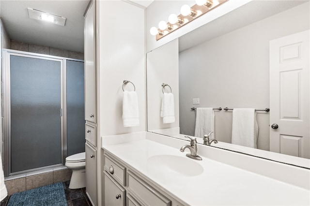 13853 Topsail St, Corpus Christi, TX 78418 - bathroom featuring vanity, a shower stall, and tile patterned flooring