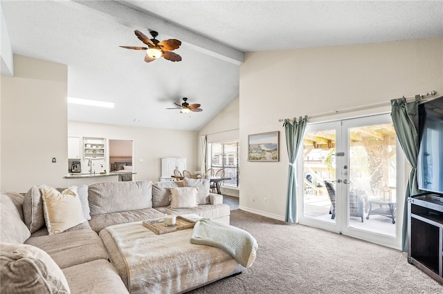 13853 Topsail St, Corpus Christi, TX 78418 - living room with a ceiling fan, carpet flooring, beamed ceiling, french doors, and high vaulted ceiling