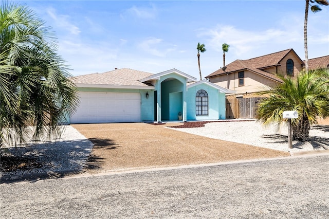 13853 Topsail St, Corpus Christi, TX 78418 - ranch-style home featuring driveway and a garage