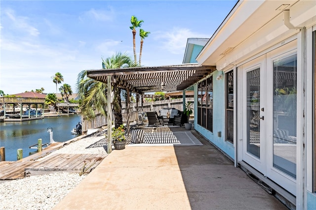 13853 Topsail St, Corpus Christi, TX 78418 - dock with a patio area and a water view