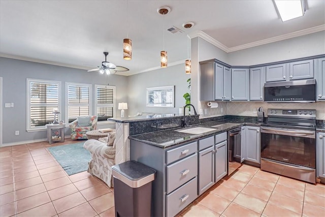 14901 Windward Dr Unit 204, Corpus Christi, TX 78418 - kitchen featuring appliances with stainless steel finishes, a sink, gray cabinetry, open floor plan, and ornamental molding