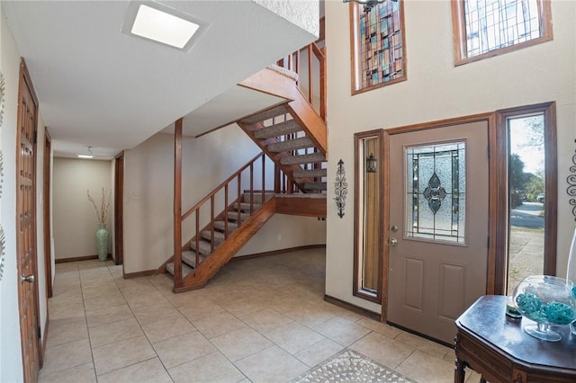 view of tiled foyer entrance