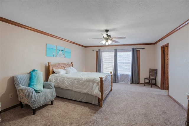 bedroom featuring crown molding, ceiling fan, light carpet, and a textured ceiling