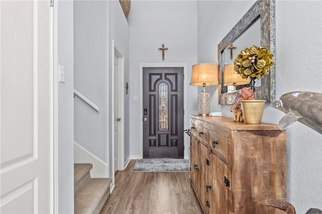 15362 Isabella Ct, Corpus Christi, TX 78418 - foyer with light wood-style floors, stairway, and a high ceiling