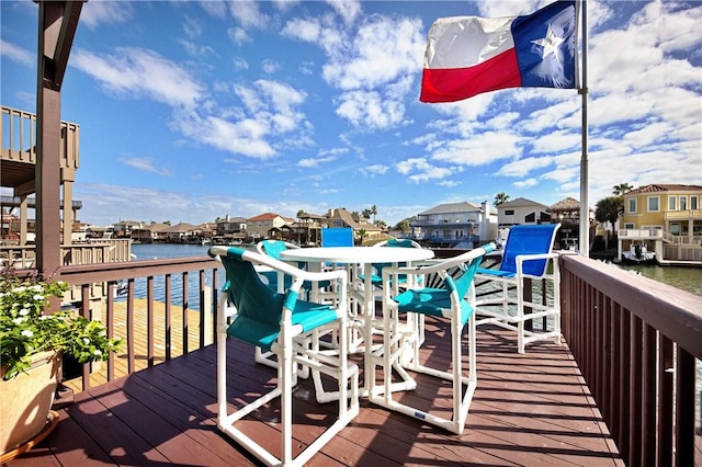 deck featuring a water view