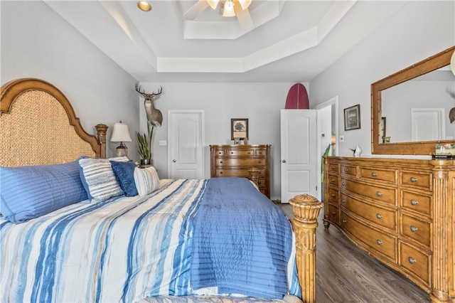 15362 Isabella Ct, Corpus Christi, TX 78418 - bedroom featuring wood finished floors, a raised ceiling, and ceiling fan