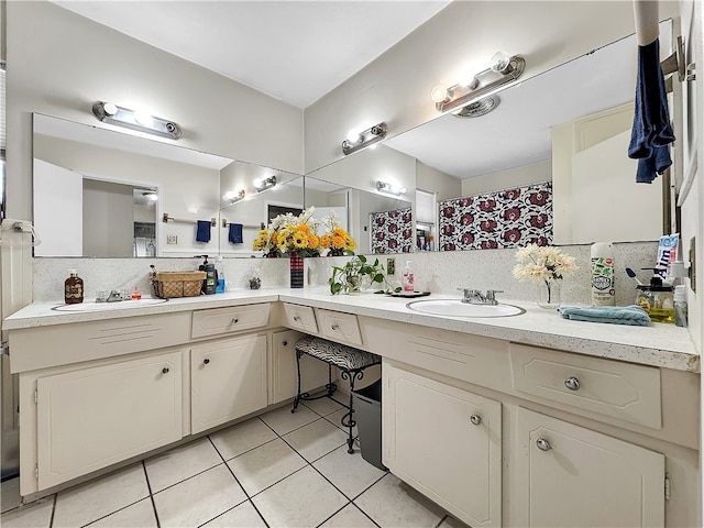 bathroom with curtained shower, decorative backsplash, tile patterned flooring, and vanity