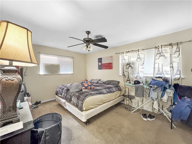 bedroom featuring ceiling fan and carpet floors