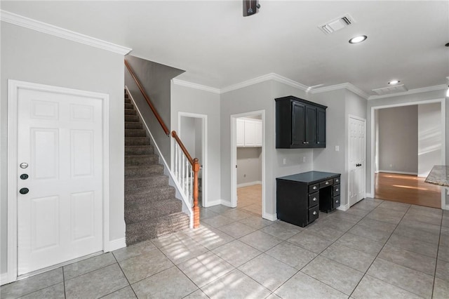 kitchen with visible vents, crown molding, baseboards, recessed lighting, and light tile patterned flooring