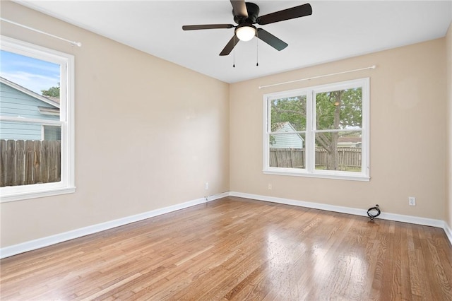 909 Cunningham St, Corpus Christi, TX 78411 - empty room featuring wood finished floors, baseboards, and a ceiling fan