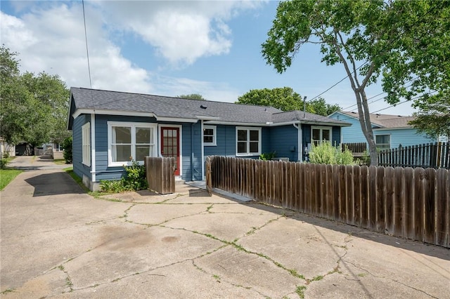 909 Cunningham St, Corpus Christi, TX 78411 - view of front of house featuring roof with shingles