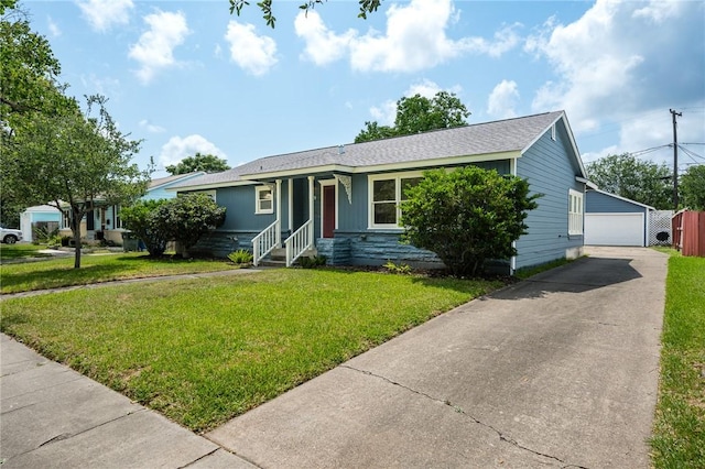 909 Cunningham St, Corpus Christi, TX 78411 - single story home featuring a front lawn, a garage, and a shingled roof
